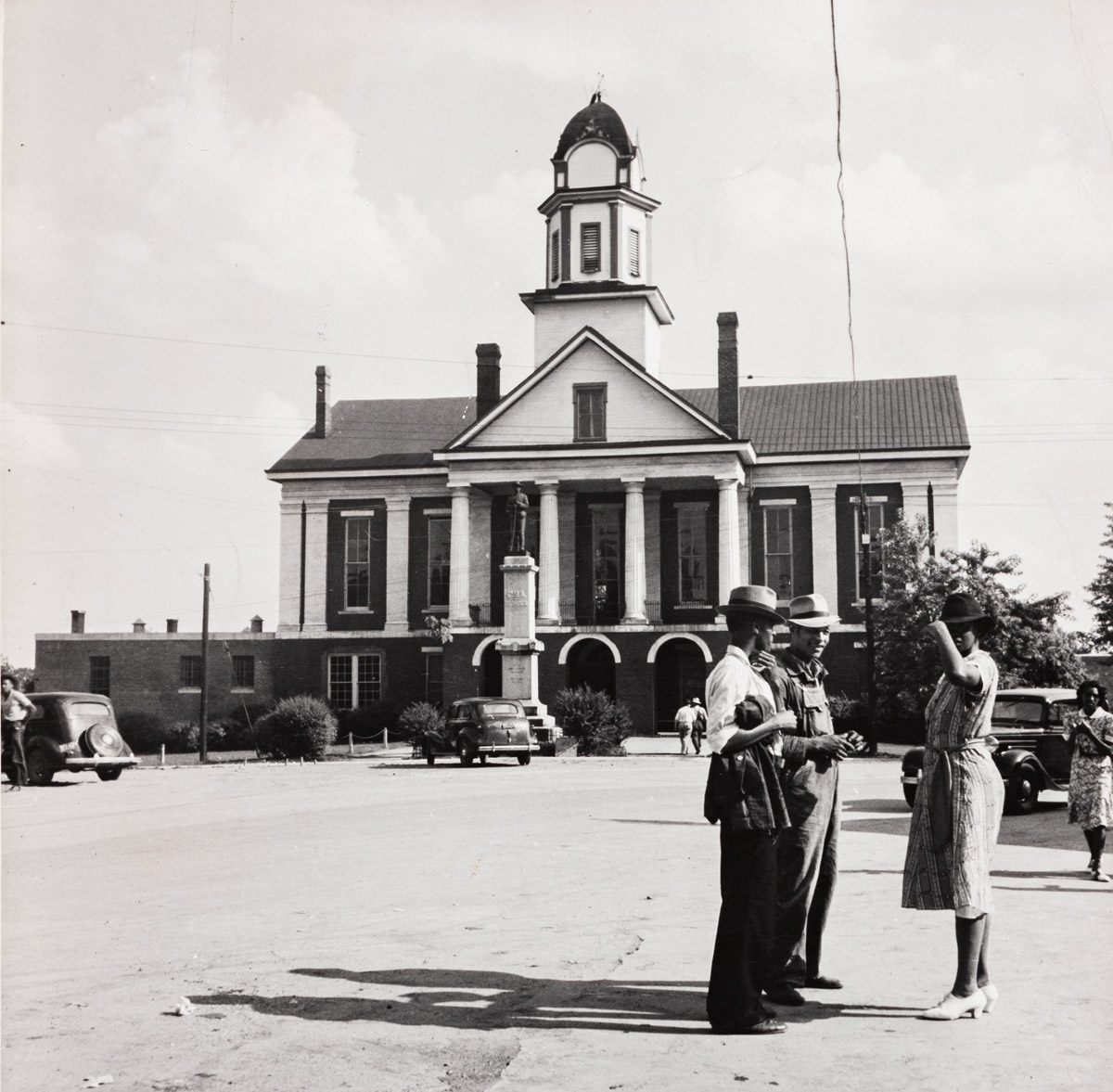 DOROTHEA LANGE (1895-1965) Court House, Pittsboro, North Carolina. Note ever present C.S.A. Monument.